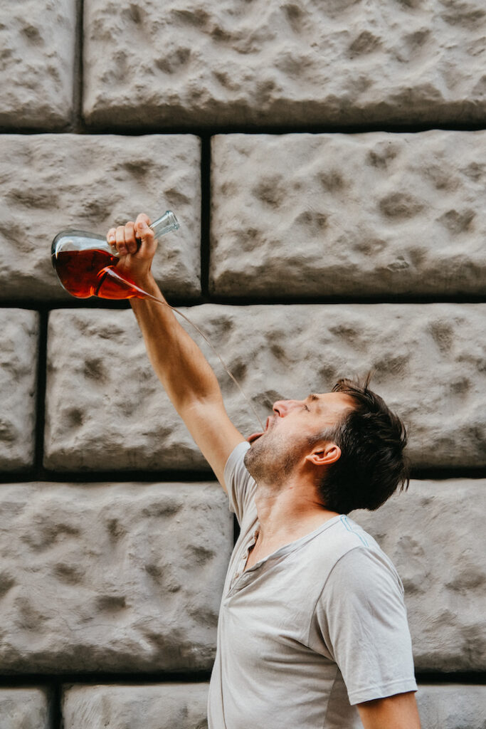 Drinking wine from a Porrón